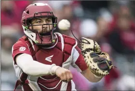  ?? (NWA Democrat-Gazette/Ben Goff) ?? Arkansas catcher Casey Opitz has been working with his older brother, Shane, who is an assistant coach at Northern Colorado to stay in shape. “My brother has a gym in his basement with a squat rack, a bunch of weights. We’re kind of doing what we can with that,” Opitz said.