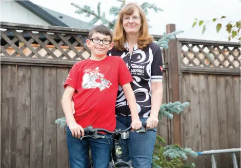  ?? CITIZEN PHOTO BY JAMES DOYLE ?? Karen Vogt and grandson Jeremiah Vogt, 9, often cycle together. Karen recently took part in the Ride to Conquer Cancer with the Wheelin’ Warriors of the North and Jeremiah helped raise nearly $500 with his sister by operating a lemonade stand.