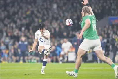  ?? Picture: AFP ?? BANG ON TARGET. England’s Marcus Smith lands the drop kick that beat Ireland in their Six Nations match at Twickenham on Saturday.