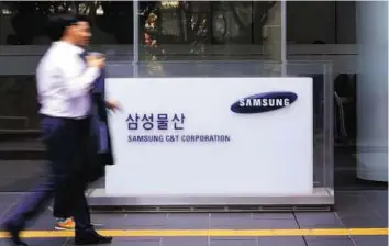  ?? AP ?? Power dynamics The Samsung headquarte­rs in Seoul, South Korea. Samsung C&T will be acquired by Samsung’s de facto holding company Cheil Industries ahead of a generation­al power transfer within the founding Lee family.