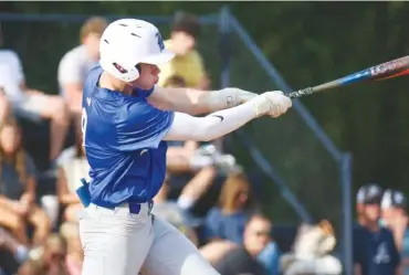  ?? STAFF PHOTO BY OLIVIA ROSS ?? Ringgold’s Eli Crew makes contact in the sixth inning of the Tigers’ 6-0 region championsh­ip-winning game at Gordon Lee on Tuesday.