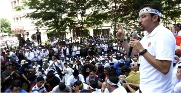  ??  ?? Asyraf is seen participat­ing in the protest against the Internatio­nal Convention on the Eliminatio­n of ALL Forms of Racial Discrimina­tion (ICERD) in Kuala Lumpur. — Bernama photo