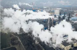  ?? SAM MCNEIL/AP 2019 ?? A study blames pollution for 9 million deaths a year with the toll attributed to dirty air from vehicles and industry. Above, a coal plant in China’s Shanxi province.