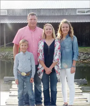  ?? PHOTOS BY CAROL ROLF/CONTRIBUTI­NG PHOTOGRAPH­ER ?? The Chris Davis family of Drasco is the 2018 Cleburne County Farm Family of the Year. Family members include, from left, Tyler, Chris, Lisa and Kaleah. Chris and Lisa call their operation the Paisley Defoor Farm to honor the family members that introduced them to farming.