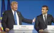  ?? STEPHEN CROWLEY / THE NEW YORK TIMES ?? President Donald Trump and French President Emmanuel Macron speak at a joint news conference in Paris on Thursday.