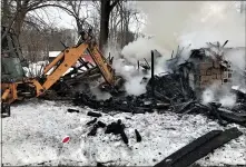  ?? SUBMITTED PHOTO — BOYERTOWN FIRE & RESCUE ?? Fire destroyed a Douglass (Berks) Township garage on Feb. 11. The structure was a total loss.