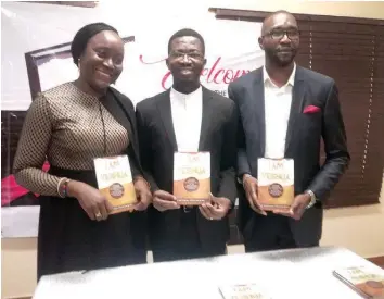  ??  ?? Wife of the author, Mrs. Blessing Osuchukwu (left); the author, Mr. Chidimma Osuchukwu and CEO of Goldmark Publishing, Abraham Chijindu Obinnaya at the launch of Iamjeshua during the recent Passover feast… in Lagos