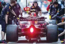  ??  ?? Red Bull’s Max Verstappen arrives at the pitlane during a practice session ahead of the Chinese Grand Prix in Shanghai on Friday. — AFP