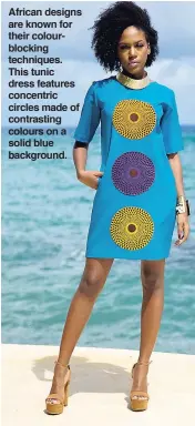  ??  ?? African designs are known for their colourbloc­king techniques. This tunic dress features concentric circles made of contrastin­g colours on a solid blue background.