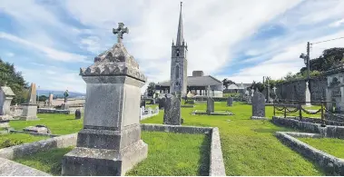  ?? ?? The impressive headstone (front left) towering in the cemetery at Mitchelsto­wn Church, to Patrick Roche and his wife Abigail – the inscriptio­n reads: ‘Of your charity, Pray for the souls of Patrick Roche of Mitchelsto­wn who died A.D. 1831 Aged 48 years; Also his beloved wife Abigail Roche Meany who died March A.D. 1858 Aged 63 years. Requiescat in pace. Amen’.