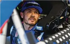  ?? Chris Graythen/Getty Images ?? Kyle Larson sits in his car in the garage area on Friday during practice for the Daytona 500.