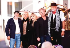  ??  ?? This file photo shows (From left) John McVie, Christine McVie, Stevie Nicks, Lindsey Buckingham and Mick Fleetwood of Fleetwood Mac posing on stage on NBC's "Today" at the NBC's Today Show in New York.