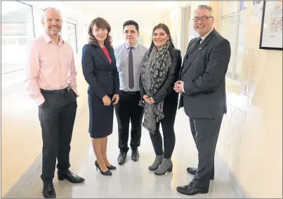  ??  ?? MENTORING BOOST: Iain MacRitchie, founder of MCR Pathways, Donna Cunningham, project director and mentor, Liam Murray, mentor, Emma Rose Forster, a member of the scheme, and Glasgow council leader Frank McAveety at St Roch’s Secondary School. Picture:...