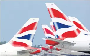  ?? REUTERS ?? British Airways tail fins are pictured at Heathrow Airport in London.