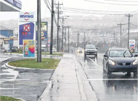  ?? GLEN WHIFFEN/THE TELEGRAM ?? Gas stations in the west end of the St. John's metro area, likes these in Mount Pearl, have kept the regular pricing, despite the arrival of Costco Wholesale in the Galway area, where fuel is up to 10 cents cheaper.