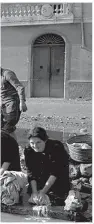  ??  ?? Left, NZ drivers wash their trucks alongside Italian women doing their washing near Alife, between Naples and Cassino, in December 1943.