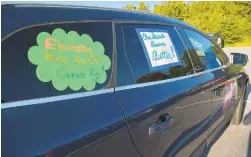  ?? PAULW. GILLESPIE/CAPITAL GAZETTE ?? Anne Arundel County public school teachers participat­ed in a caravan, organized by the TAAAC teachers union, on Monday around the Board of Education in Annapolis.