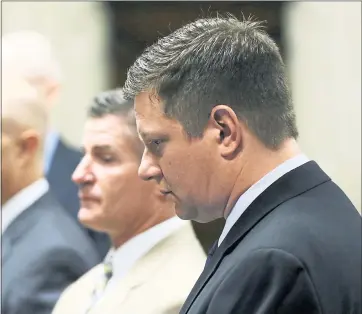  ?? JOHN J. KIM – CHICAGO TRIBUNE VIA AP, POOL ?? Chicago police officer Jason Van Dyke, right, stands with attorneys Wednesday during his murder trial in Chicago.