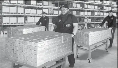  ?? ?? FLYING OUT THE DOOR: Lucky Connecticu­t residents are hoping to find their zip code listed in today’s publicatio­n, but not everybody will. That’s why those who do need to immediatel­y call the State Distributi­on Hotlines. Everyone who does is authorized to claim sealed Vault Bricks loaded with the only Connecticu­t State Gold Bank Rolls known to exist for the lowest ever $4 per coin minimum set for Connecticu­t residents - non-state residents and those who miss the 48 hour deadline must pay per coin, if any remain.