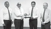  ??  ?? Pictured here at the signing of the agreement are (from left) Commercial Bank’s Deputy General Manager – Marketing Hasrath Munasinghe and the Bank’s Managing Director/CEO JeganDurai­ratnam with DialogAxia­ta’s Group Chief Executive, Mr Supun...