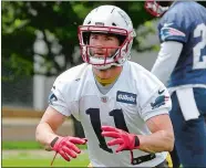  ?? STEVEN SENNE/AP PHOTO ?? In this June 7 file photo, Patriots wide receiver Julian Edelman waits for the ball during minicamp practice.