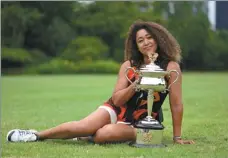  ?? REUTERS ?? Naomi Osaka poses with the Australian Open trophy at the Royal Botanic Gardens Victoria in Melbourne on Sunday.