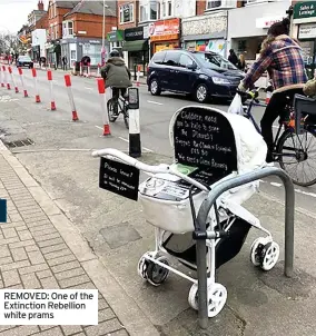  ??  ?? REMOVED: One of the Extinction Rebellion white prams