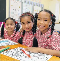  ?? Picture: WERNER HILLS ?? NEW ADVENTURE: Grade 1 pupils in Port Elizabeth had their orientatio­n at school on Tuesday before the schools officially opened yesterday. New friends, from left, Jameelah Laher, Shiloh Freeman, and Eve van Rensburg, all aged 6, in their Grade 1 class...