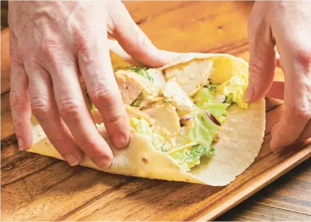  ?? CHEYENNE COHEN ?? The sandwich is the mainstay of most kids’ lunches, but wraps have also taken their place in the pantheon of sandwich possibilit­ies.