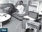  ??  ?? 1964
That song is a knockout. American boxer Cassius Clay (later Muhammad Ali) relaxed after his world heavyweigh­t victory over Sonny Liston by playing records.