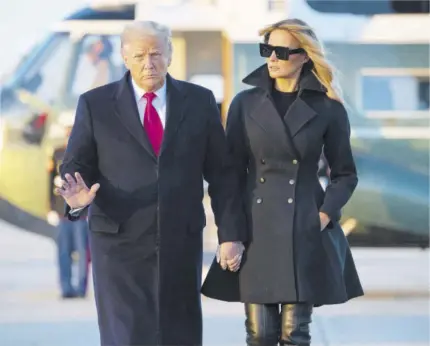  ?? (Photo: AFP) ?? US President Donald Trump and First Lady Melania Trump walk to board Air Force One prior to departure from Joint Base Andrews in Maryland, December 23, 2020, as they travel to Mar-a-lago for Christmas and new year’s.