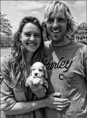 ?? SUBMITTED PHOTO ?? Mark Moore met his wife Emma through kitesurfin­g. They have a dog called Breeze, a cocker spaniel-poodle mix.