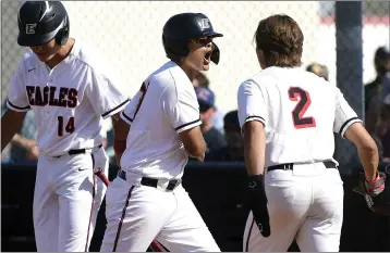  ?? WILL LESTER — STAFF PHOTOGRAPH­ER ?? Etiwanda’s Armando Briseno, center, celebrates with teammate Austen Roellig (2) after hitting a home run against Temecula Valley on May 5. The Eagles travel to Palos Verdes today for a Division 2 semifinal game.