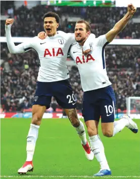  ??  ?? Delle Ali and Kane celebrate after a goal for Tottenham