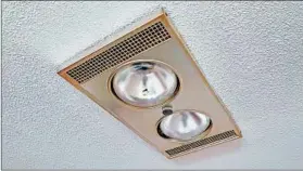  ?? DREAMSTIME ?? Bathroom exhaust fans can include extras such as lights or humidity sensors.