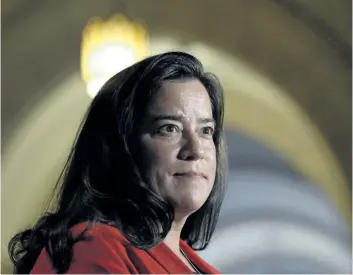  ?? ADRIAN WYLD/THE CANADIAN PRESS FILES ?? Justice Minister Jody Wilson-Raybould speaks to members of the media on Parliament Hill in Ottawa. WilsonRayb­ould is considerin­g lowering the legal alcohol limit for licensed drivers.