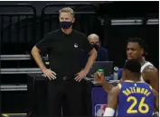  ?? NHAT V. MEYER — BAY AREA NEWS GROUP ?? Warriors coach Steve Kerr coaches from the sidelines against the Sacramento Kings at the Golden 1Center in Sacramento on Dec. 17.