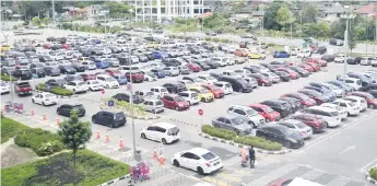  ?? — Bernama photo ?? Car sales volume for May is expected to be significan­tly higher than April with the re-opening of business, but still lower than traditiona­l monthly registrati­ons prior to MCO, with long queues at Puspakom, JPJ, cautious consumer spending, and stringent loan approval.