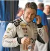  ?? O’MEARA/AP CHRIS ?? ARCA driver Marco Andretti puts in his earpiece before an ARCA Menards Series practice Thursday at Daytona Internatio­nal Speedway in Daytona Beach, Fla.