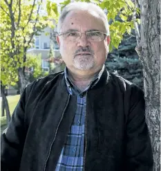  ?? JEFF McINTOSH/THE CANADIAN PRESS ?? Alberta Chief Scientist Fred Wrona outside his home in Calgary.