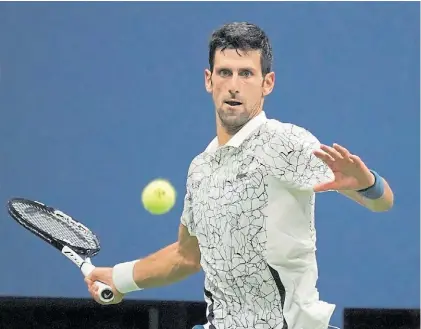  ?? AFP ?? Concentrac­ión. Uno de los grandes argumentos de Djokovic. Así pasó a Nishikori. Así irá por Del Potro.