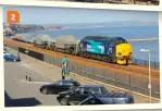  ?? COLOUR RAIL ?? 2
2: With a pair of KUA nuclear flask carriers in tow, 37423 Spirit of the Lakes traverses the sea wall at Dawlish, heading to the Royal Navy’s Devonport
dockyard. Note the striking style of DRS branding in this April 2014 view.