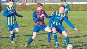  ??  ?? Dundee West (blue/yellow) lost 6-5 to Monifieth Athletic in the U/17 Dave Pullar League at Downfield.