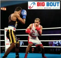  ?? PHOTOS: ABHISHEK SHUKLA ?? Gujarat Giants’ skipper Amit Panghal (R) beat Punjab Panthers’ P.L. Prasad by 5-0 on Day 7 of the Big Bout Indian Boxing League being held at Indira Gandhi Indoor Stadium in New Delhi.