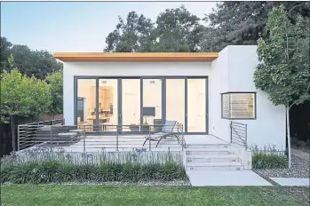  ?? PHOTO BY DAVE EDWARDS ?? The pandemic has pushed the demand for accessory dwelling units, or ADUs, like this one in Palo Alto designed by Maydan Architects.