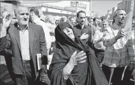  ?? Abedin Taherkenar­eh European Pressphoto Agency ?? IRANIANS in Tehran protest the hajj deaths. Some were outraged by Saudi suggestion­s linking the tragedy to pilgrims’ failure to heed crowd-control regulation­s.