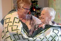  ?? SCOTT HAMMOND/ STUFF ?? Maria Bowden, left, was awarded a Kiwibank 2019 Local Hero of the Year. She made a quilt for her mother, Miriam Sullivan, right, and then 31 more for the other residents of Seaview Rest Home.