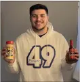  ?? COURTESY BYRON FLOYD ?? Byron Floyd, a graduate of Mentor, is raising money for a children’s hospital in Pittsburgh through donations as well as sales of “Snapper 49” clothing, seasoning and hot sauce. He is the starting long snapper for the University of Pittsburgh football team.