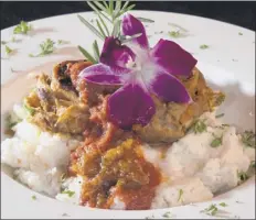  ??  ?? Osso Buco with grits and parmesan at Sans Souci in Queensbury.