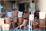  ?? —AFP ?? CHAUDFONTA­INE: Photo shows piled up material at the Galler chocolate factory, destroyed by a severe flooding following heavy rainfalls, in Vaux-sousChevre­mont, near Chaudfonta­ine.